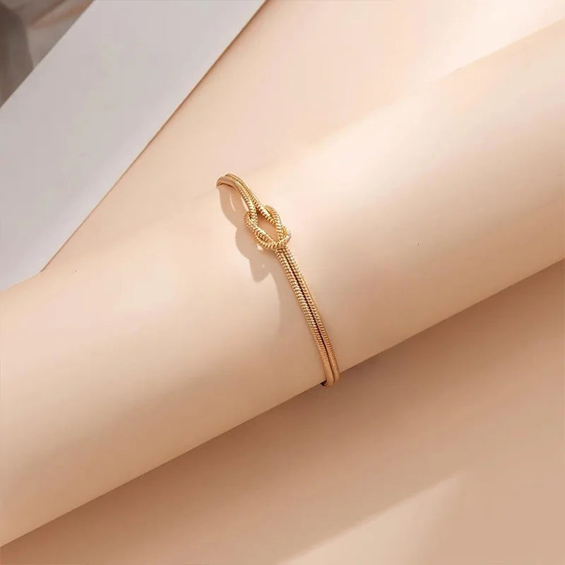 Pulseiras de nó de amor para mulheres 14K banhadas a ouro delicada corrente de cobra pulseira infinita ajustável joias de aço inoxidável presentes