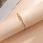 Pulseiras de nó de amor para mulheres 14K banhadas a ouro delicada corrente de cobra pulseira infinita ajustável joias de aço inoxidável presentes