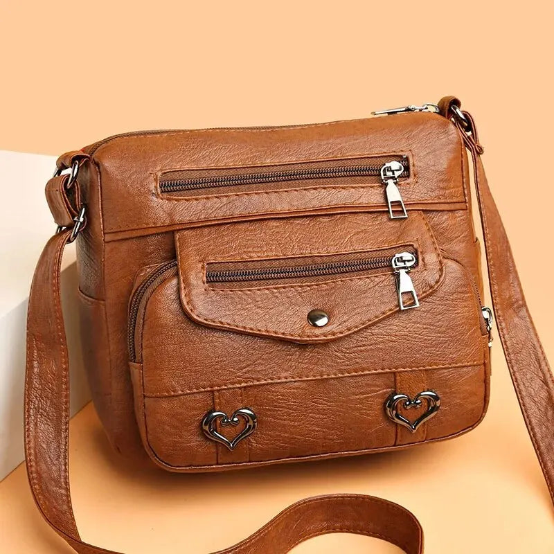 Bolsa crossbody de couro macio para mulheres, grande capacidade, bolsa para mãe na moda, partida diária, material PU, abertura do zíper, elemento cardíaco, médio
