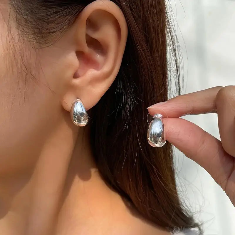 Retro brilhante gota de água pendurado brincos femininos leve oco grosso lágrima ouro prata grosso aros moda jóias