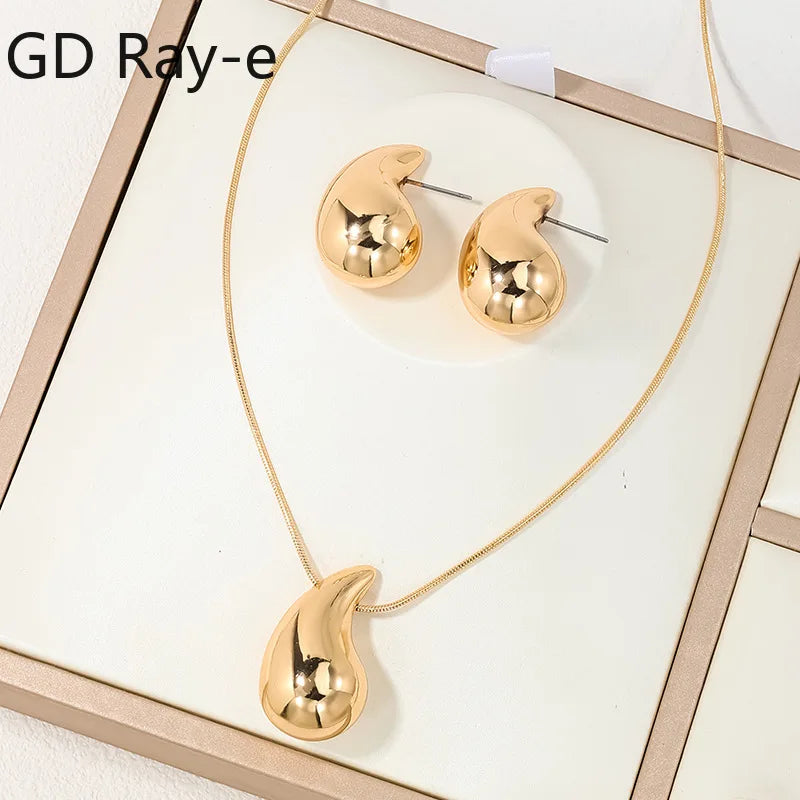 Conjunto Elegância Gotas Douradas Linda Top